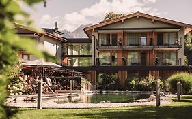 Wellness und Brunch Hotel MorgenZeit beheizter Naturteich Genuss Frühstück bis 13 Uhr Hochkönig Sommercard